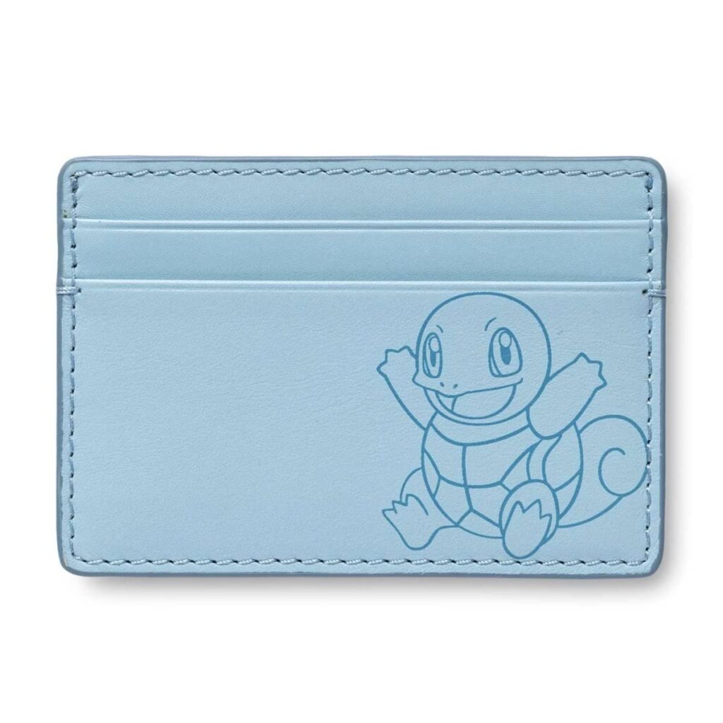 0aefefc8-644f-5216-93f2-f74f7696c943-1024x1024-1.jpg Pokémon Center × Fossil: Squirtle Blue Leather Steven Card Case - Image 1