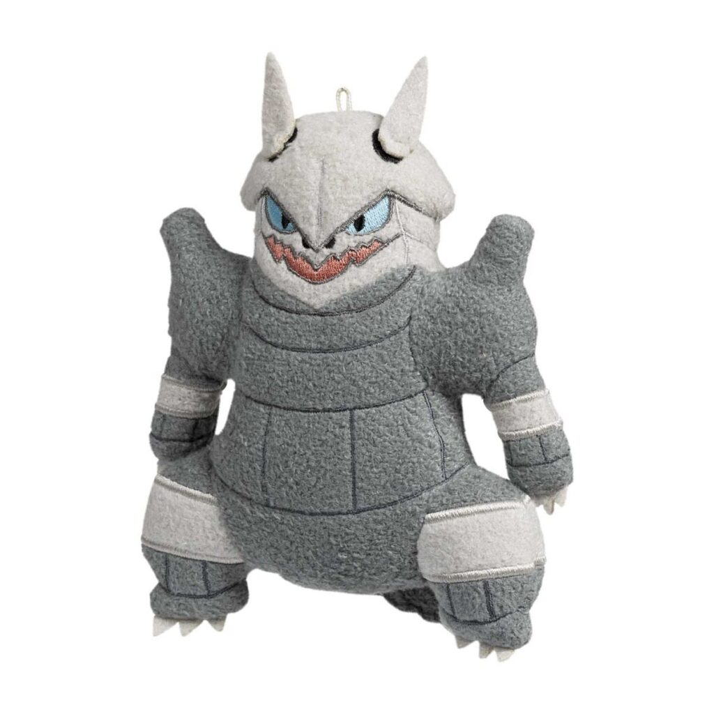 129d5c25-fdf0-5a89-ba4c-eb5ce2b1d081-1024x1024-1.jpg Aggron Home Sweet Cave Plush Key Chain - Image 1